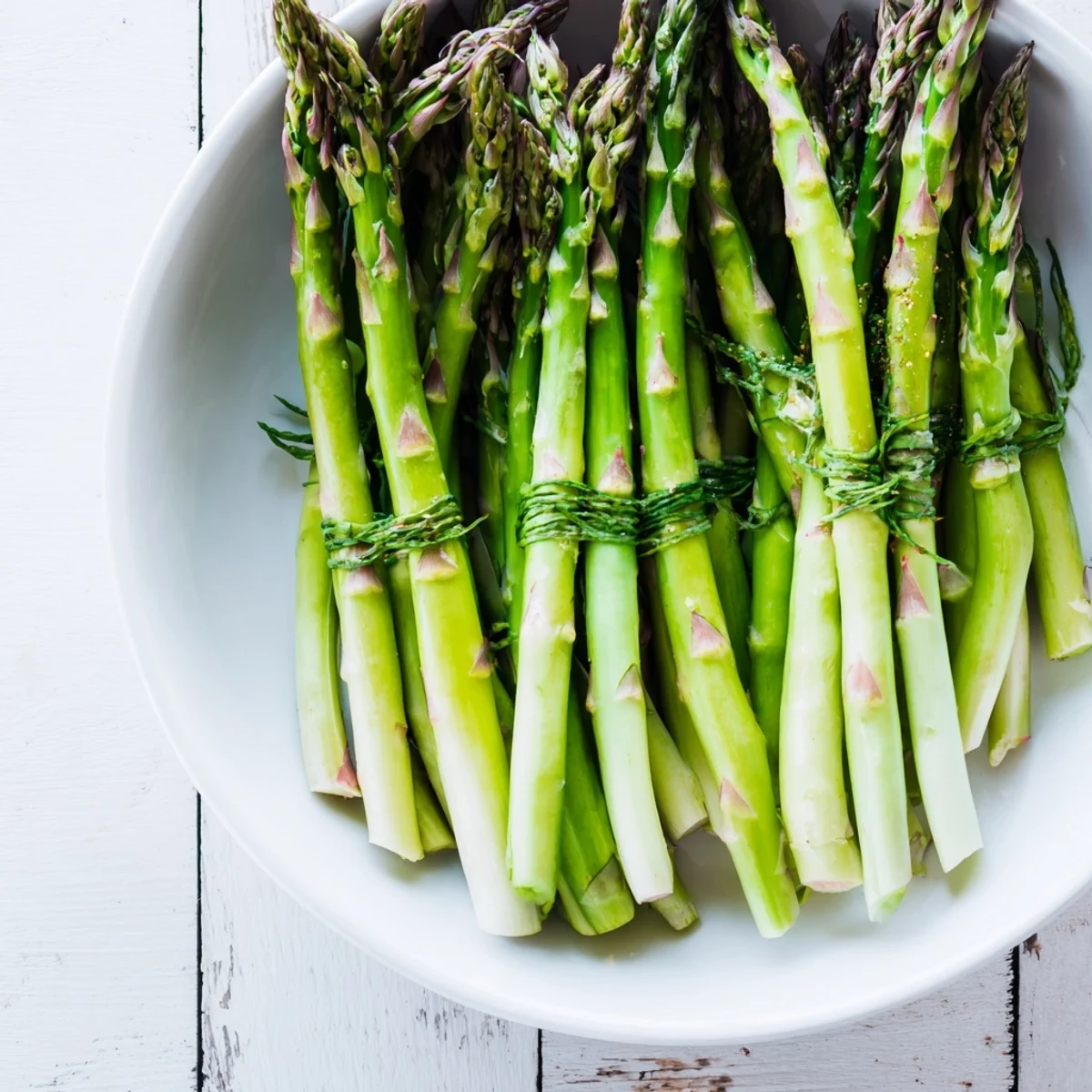 Fresh-made Botanical Lattice: a close-up of colorful berries nestled within asparagus weave.