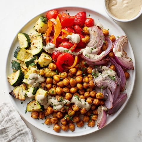 A delicious Mediterranean Chickpea and Veggie Grain Bowl, brimming with textures and flavors: perfect for a healthy meal.