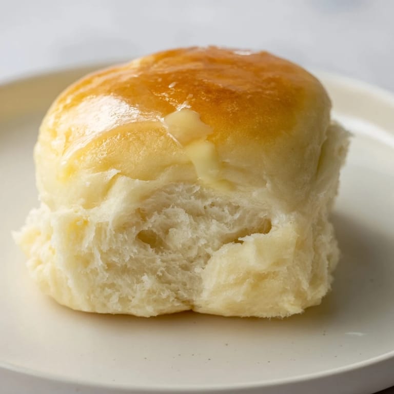 These soft, pillowy Quick-Rise Dinner Rolls are perfect for soaking up delicious gravy and sauces.