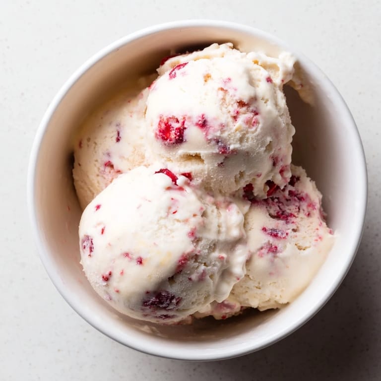 Scoops of homemade cottage cheese ice cream served, a protein-packed and naturally sweet treat.