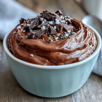 Creamy chocolate mousse made with cottage cheese, cocoa, and dark chocolate for a rich, protein-packed dessert.